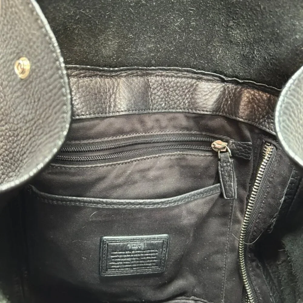 tumi black all weather leather back pack adventure travel